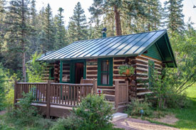Pine Cabin, under the trees and near the waterfall, seems built for a honeymoon. The Ranch at Emerald Valley, Pike National Forest, Colorado Springs, CO. / EVR_IMG_2255 - ©Steve Haggerty/ColorWorld